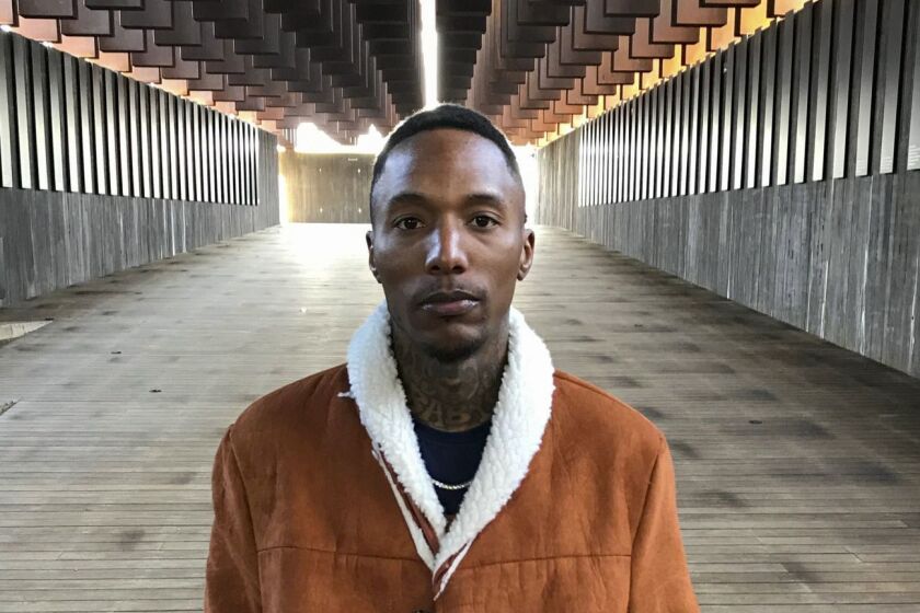 Musician Rubberband OG tours the National Memorial for Peace and Justice Thursday, Dec. 6, 2018, in Montgomery, Ala. (CREDIT: Julie Bennett / For The Times)
