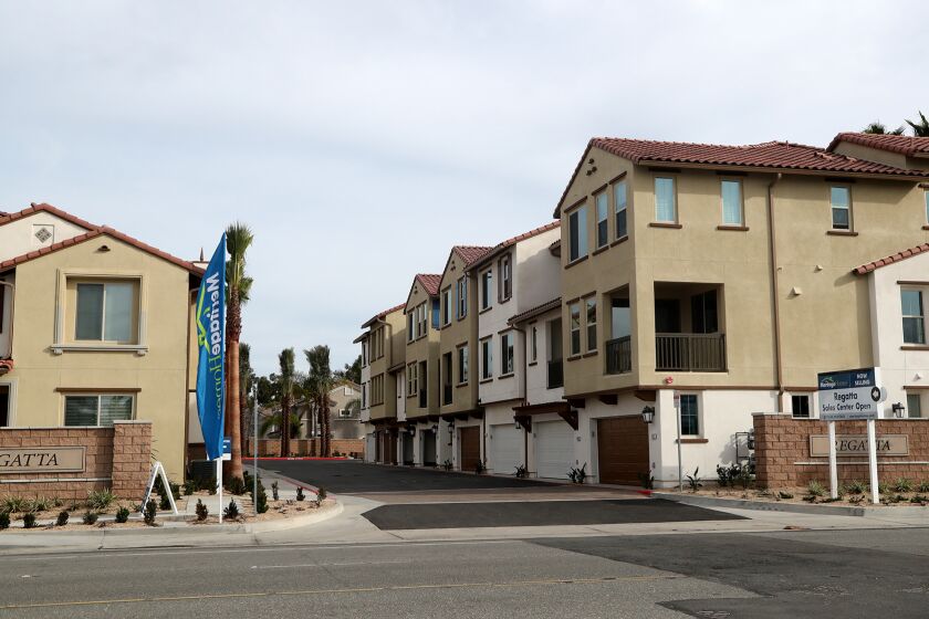 The Regatta is a new condo complex in Huntington Beach. (Kevin Chang / Daily Pilot)
