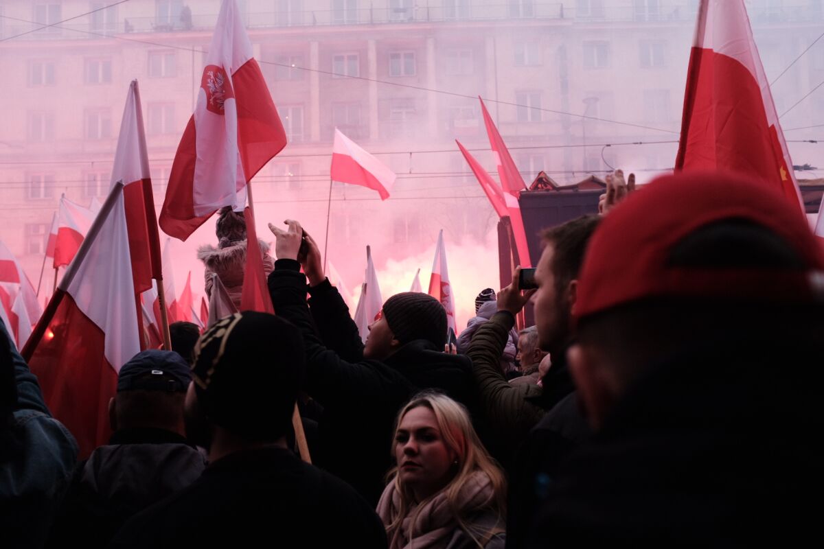 Flag-bearing Poles, including families with children, veterans, the elderly and members of the far right, march through Warsaw on Nov. 11, 2019, Poland's Independence Day.
