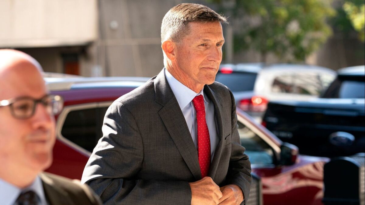 Michael Flynn, the former National Security Advisor, walks into the Federal courthouse in Washington on July 10.