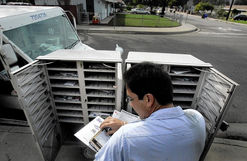 People who opt out of receiving promotional offers from Bank of America have to restate their decision every five years. Above, mail is delivered in Pomona.