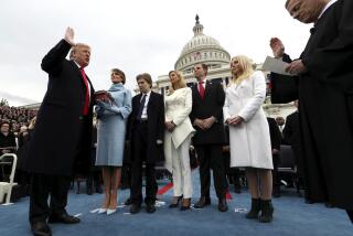 President Donald Trump takes the oath of office from Chief Justice John Roberts, as his wife Melania holds the Bible, and with his children Barron, Ivanka, Eric and Tiffany, Friday, Jan. 27, 2017 on Capitol Hill in Washington. (Jim Bourg/Pool Photo via AP)