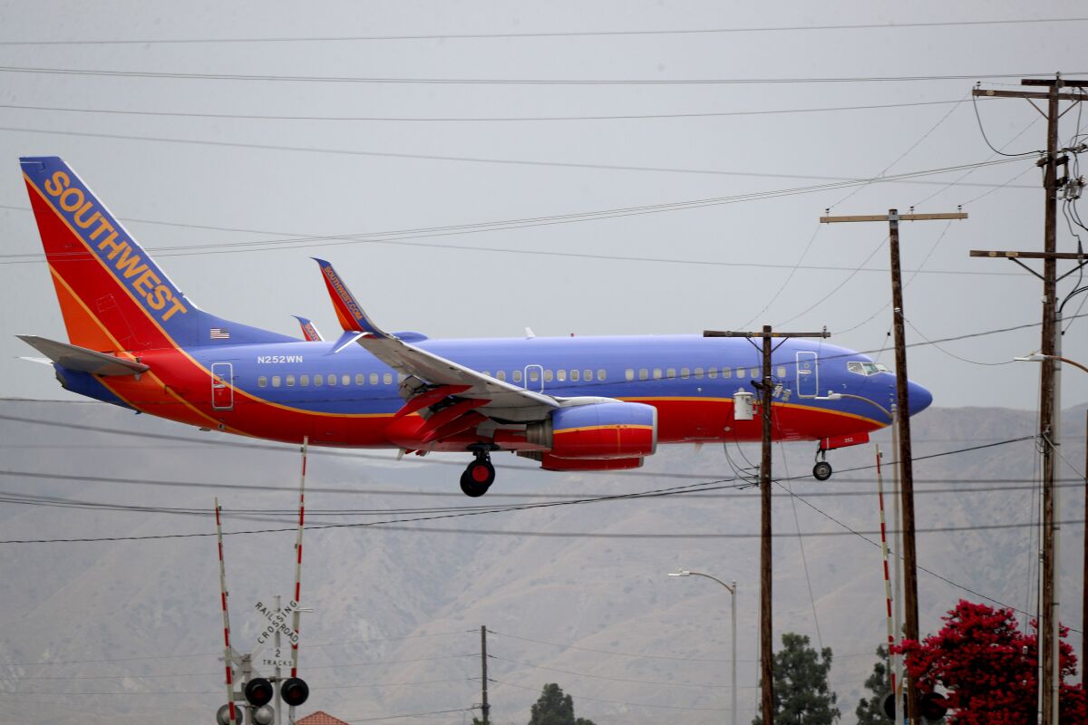 A Southwest Airlines flight descends near Burbank.