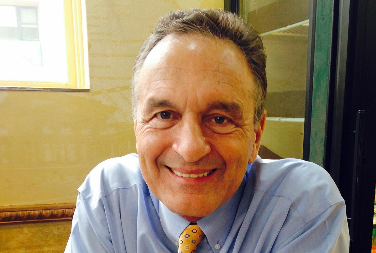 Fred DeLuca, shown in 2014, opened his first sandwich shop at the age of 17 to help pay for college. The Subway co-founder died Monday after being diagnosed with leukemia two years ago.