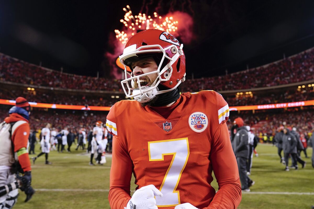 Kansas City Chiefs kicker Harrison Butker celebrates after the team's victory over the Cincinnati Bengals.