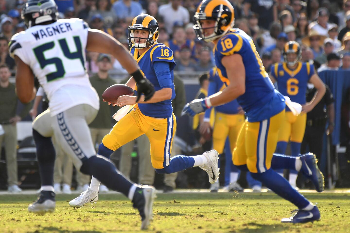 Rams quarterback Jared Goff scrambles for yards against the Seattle Seahawks at the Coliseum on Sunday.