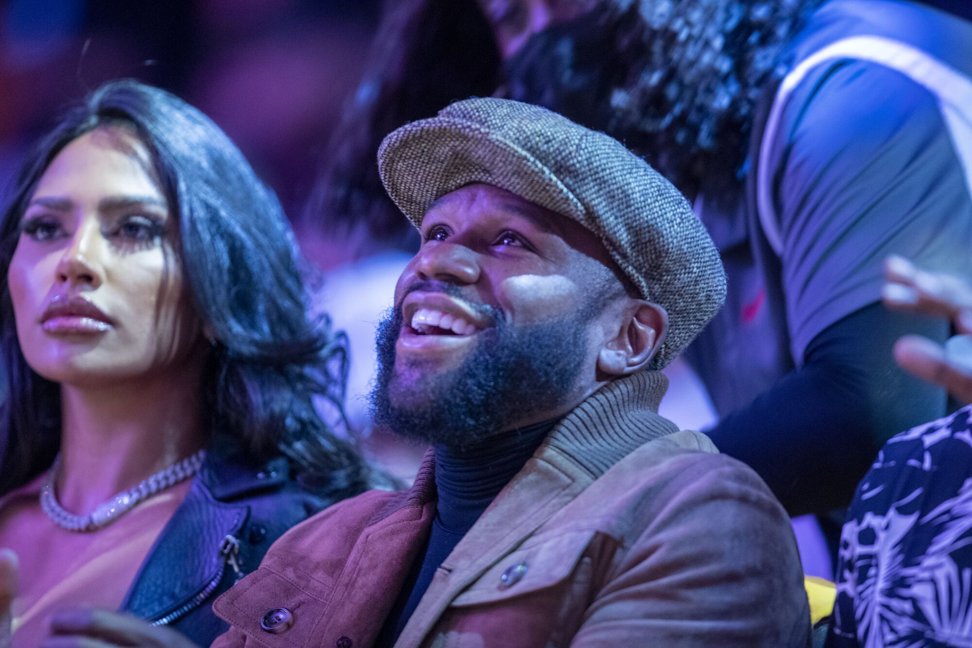Floyd Mayweather Jr. watches the Lakers at Staples Center.