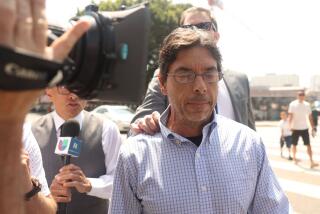 Los Angeles , CA - August 29: Mark Chavez, one of the two doctors charged in connection with the death of actor Matthew Perry, is swarmed by media as he walks into court with his lawyer for his arraignment at Edward R. Roybal Federal Building on Thursday, Aug. 29, 2024 in Los Angeles, CA. (Michael Blackshire / Los Angeles Times)