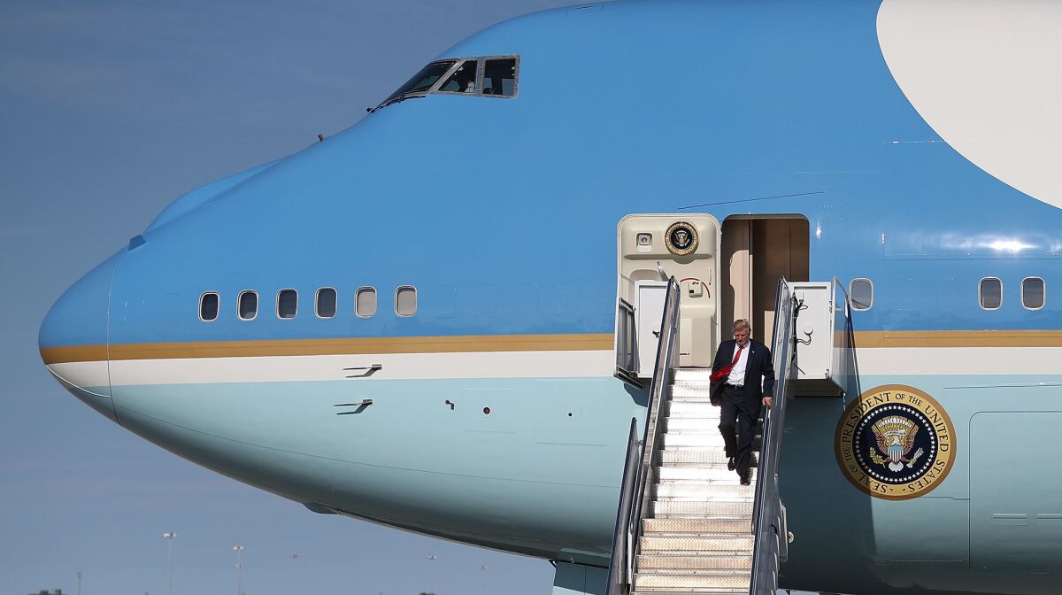 President Trump arrives at Palm Beach International Airport in Florida.