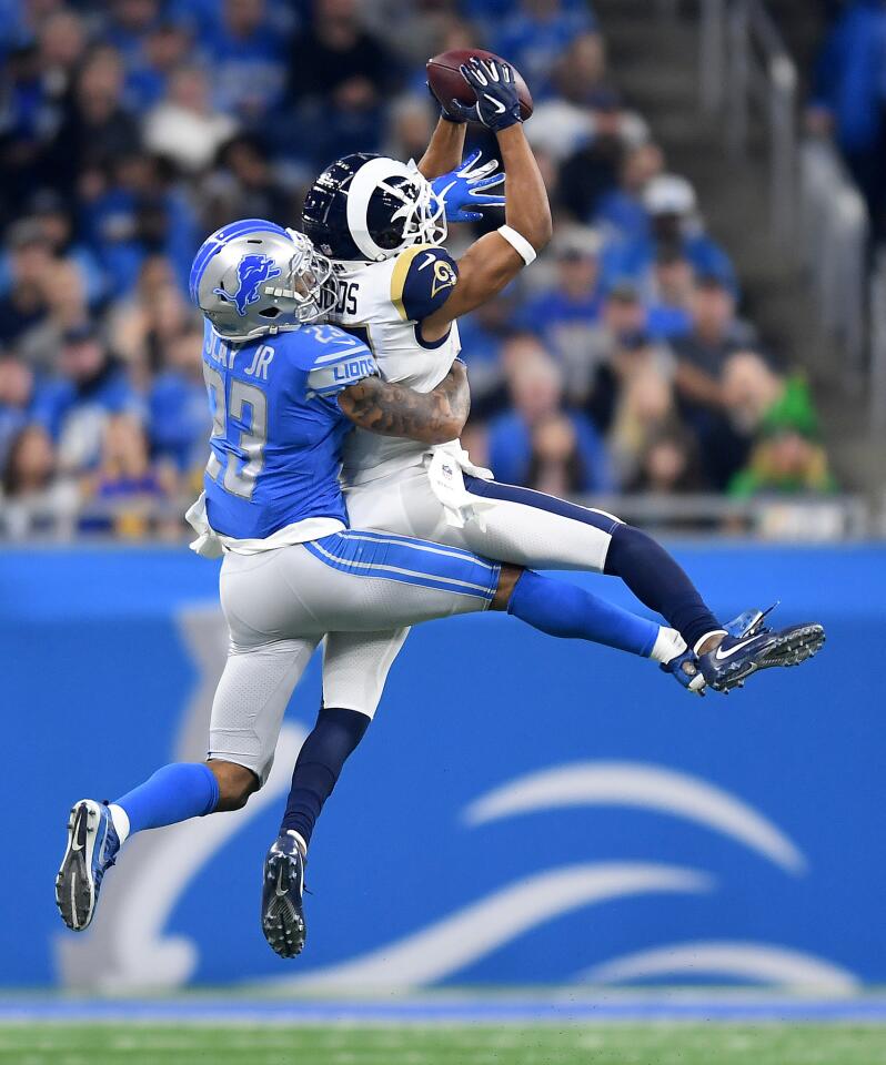 Rams receiver Robert Woods makes a catch in front of Detroit Lions conrerback Darius Slay in the first quarter at Ford Filed in Detroit on Sunday.