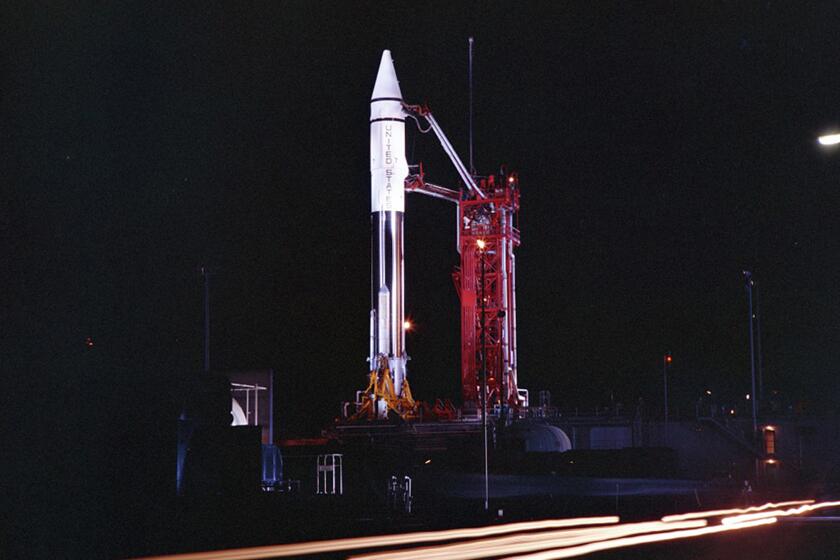 This Sept. 20, 1966 photo provided by the San Diego Air and Space Museum shows an Atlas Centaur 7 rocket on the launchpad at Cape Canaveral, Fla. NASA's leading asteroid expert, Paul Chodas, speculates that asteroid 2020 SO, as it is formally known, is actually a Centaur upper rocket stage that propelled NASA’s Surveyor 2 lander to the moon in 1966 before it was discarded. (Convair/General Dynamics Astronautics Atlas Negative Collection/San Diego Air and Space Museum via AP)