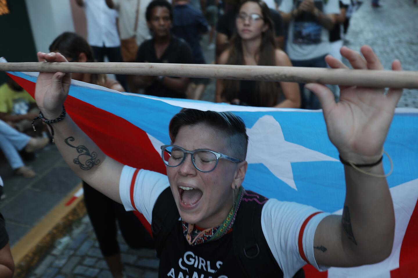 Crowd calls for Puerto Rico Governor Ricardo Rossello Resignation over leaked chats.