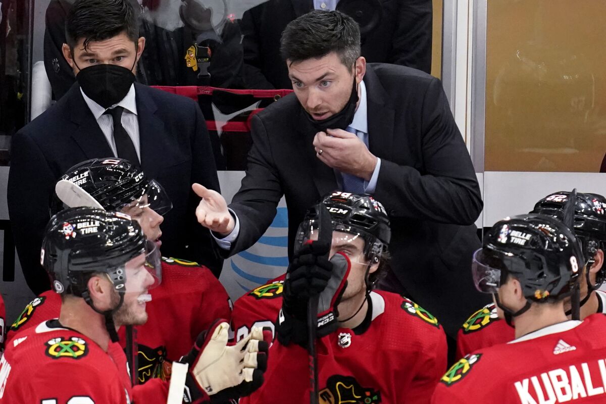 FILE - Chicago Blackhawks head coach Jeremy Colliton reacts as he talks to his team during the third period of an NHL hockey game against the Detroit Red Wings in Chicago, Sunday, Oct. 24, 2021. The Chicago Blackhawks fired coach Jeremy Colliton on Saturday, Nov. 6, 2021 dismissing the former NHL forward with the team off to a rough start in his fourth season.(AP Photo/Nam Y. Huh, File)
