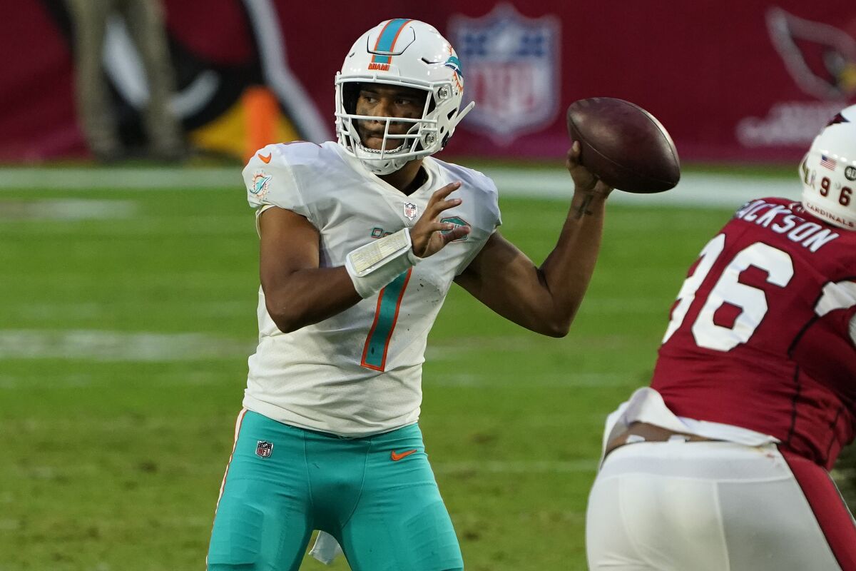 Miami Dolphins quarterback Tua Tagovailoa (1) throws against the Arizona Cardinals in Week 9.