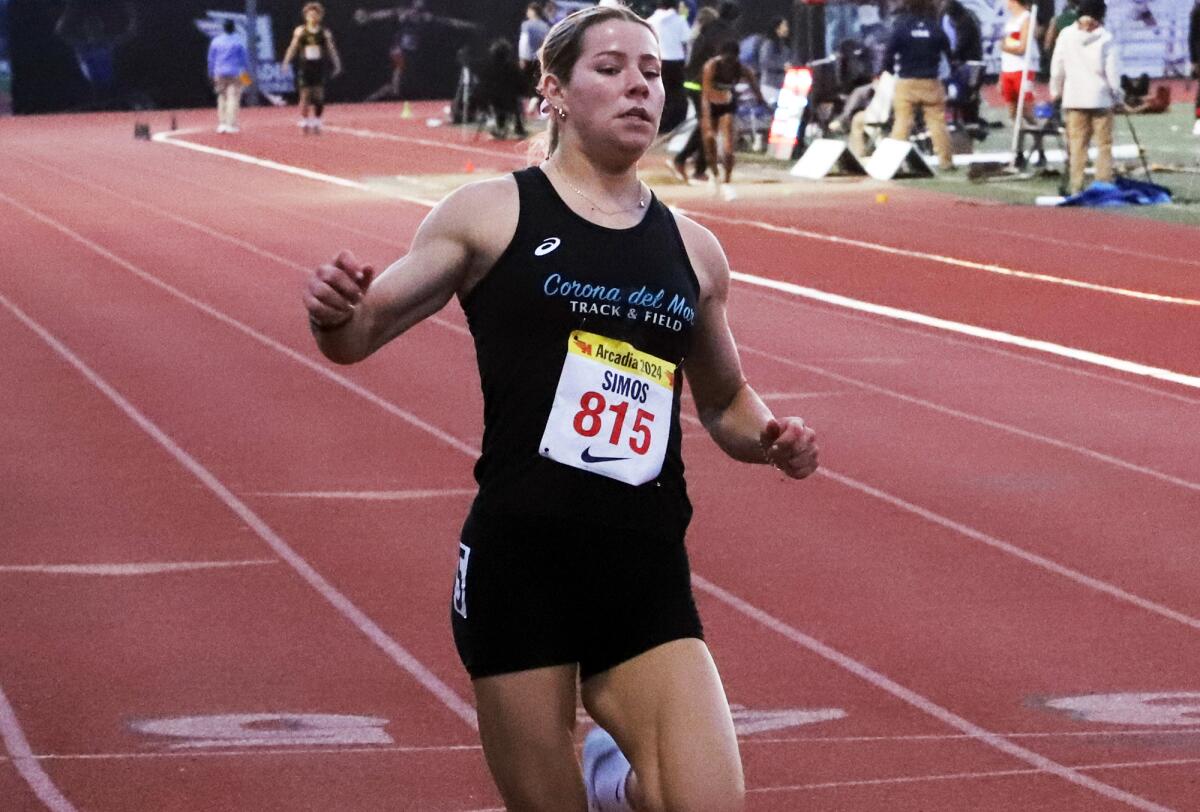 Corona del Mar's Ava Simos competes in the 200 meters seeded race of the Arcadia Invitational on Saturday.