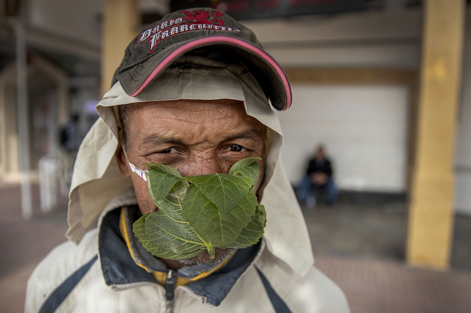 MOROCCO: A 55-year-old street vendor named Abderrahim poses for a portrait while wearing a mask made of fig leaves in Rabat.