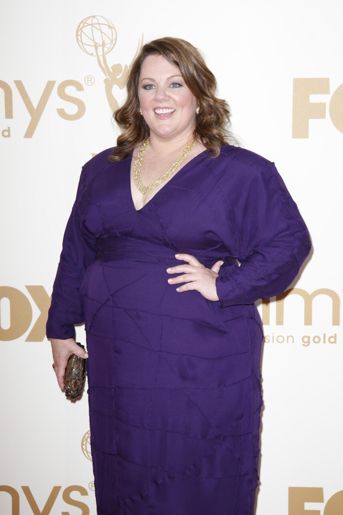 "Bridesmaids" and "The Heat" star Melissa McCarthy will design her own clothing line. She designed this dress for the 2011 Emmy Awards with Daniella Pear.
