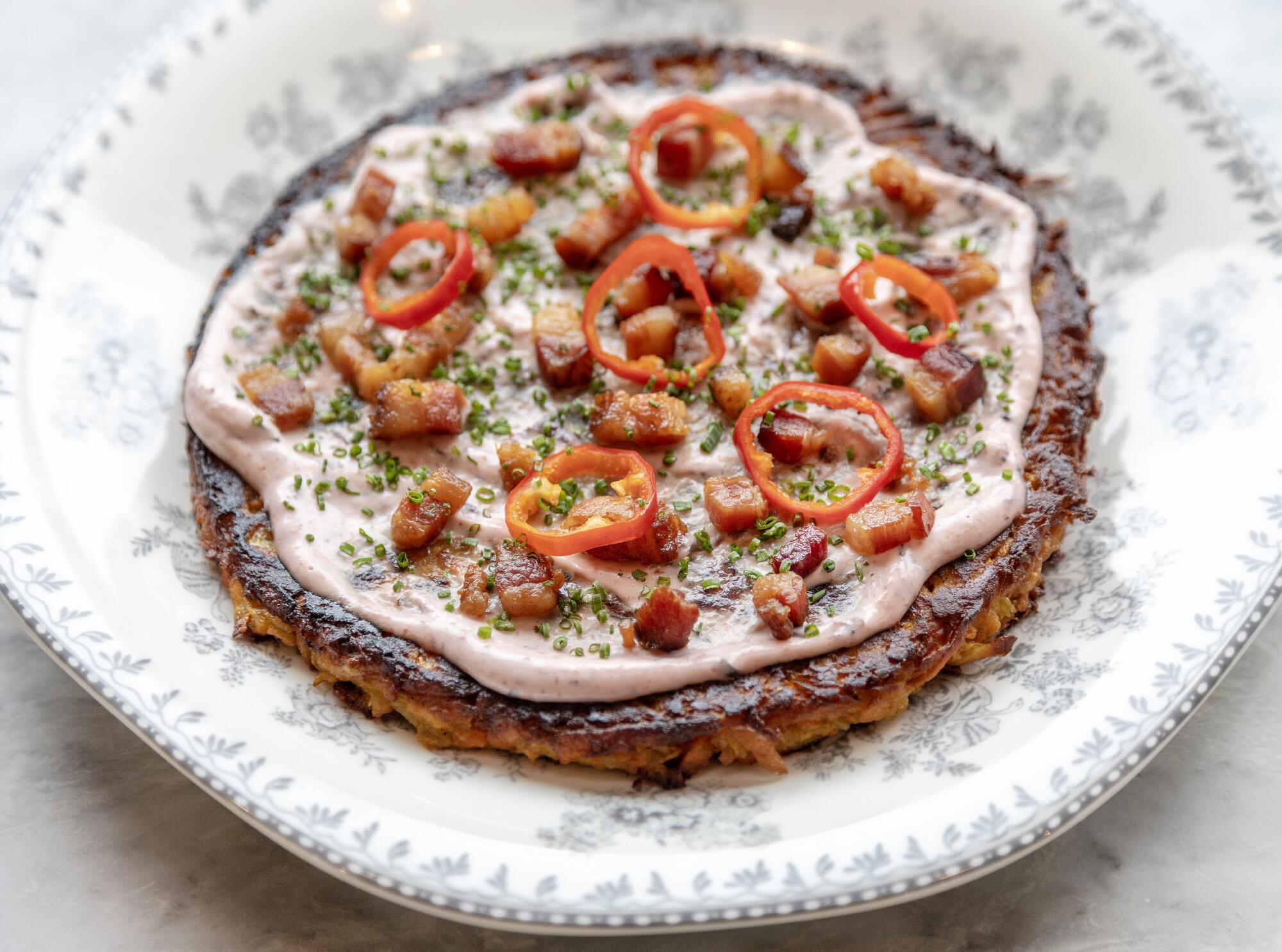 A sweet potato pancake with cream and peppers at Fiona.