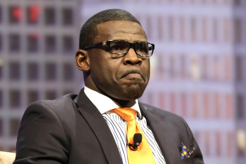 Former Dallas receiver Michael Irvin takes part in a panel discussion on June 23.