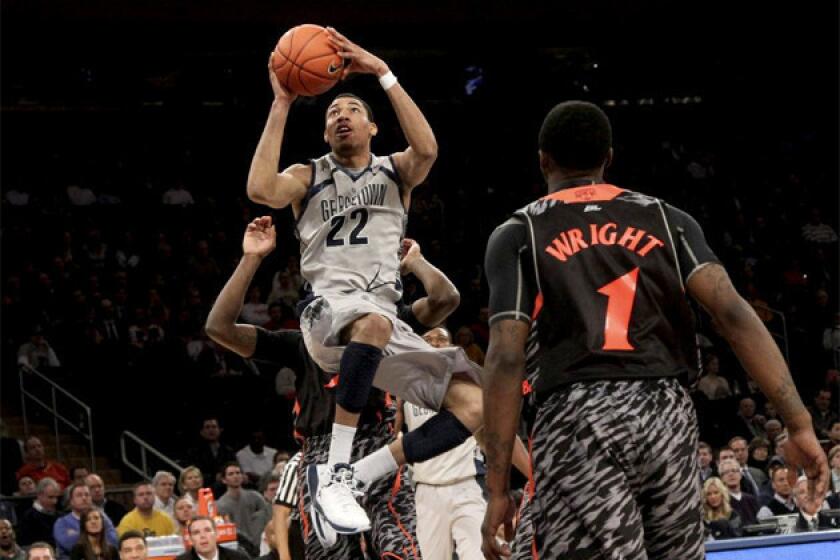 Georgetown's Otto Porter Jr. (22) goes up for a shot against Cincinnati.