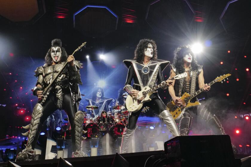 Gene Simmons, left, Tommy Thayer, Paul Stanley of KISS perform during the final night of the "Kiss Farewell Tour" on Saturday, Dec. 2, 2023, at Madison Square Garden in New York. (Photo by Evan Agostini/Invision/AP)
