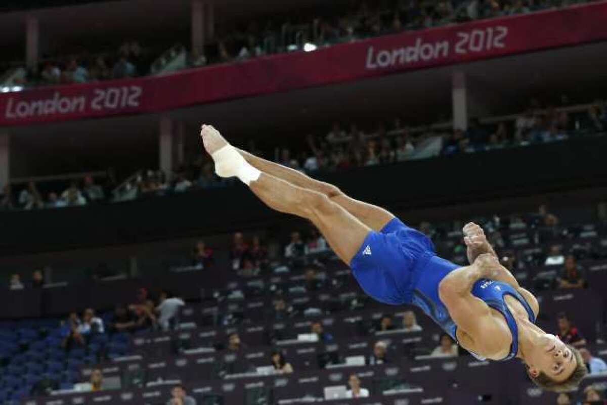 Sam Mikulak competes on the floor exercise.