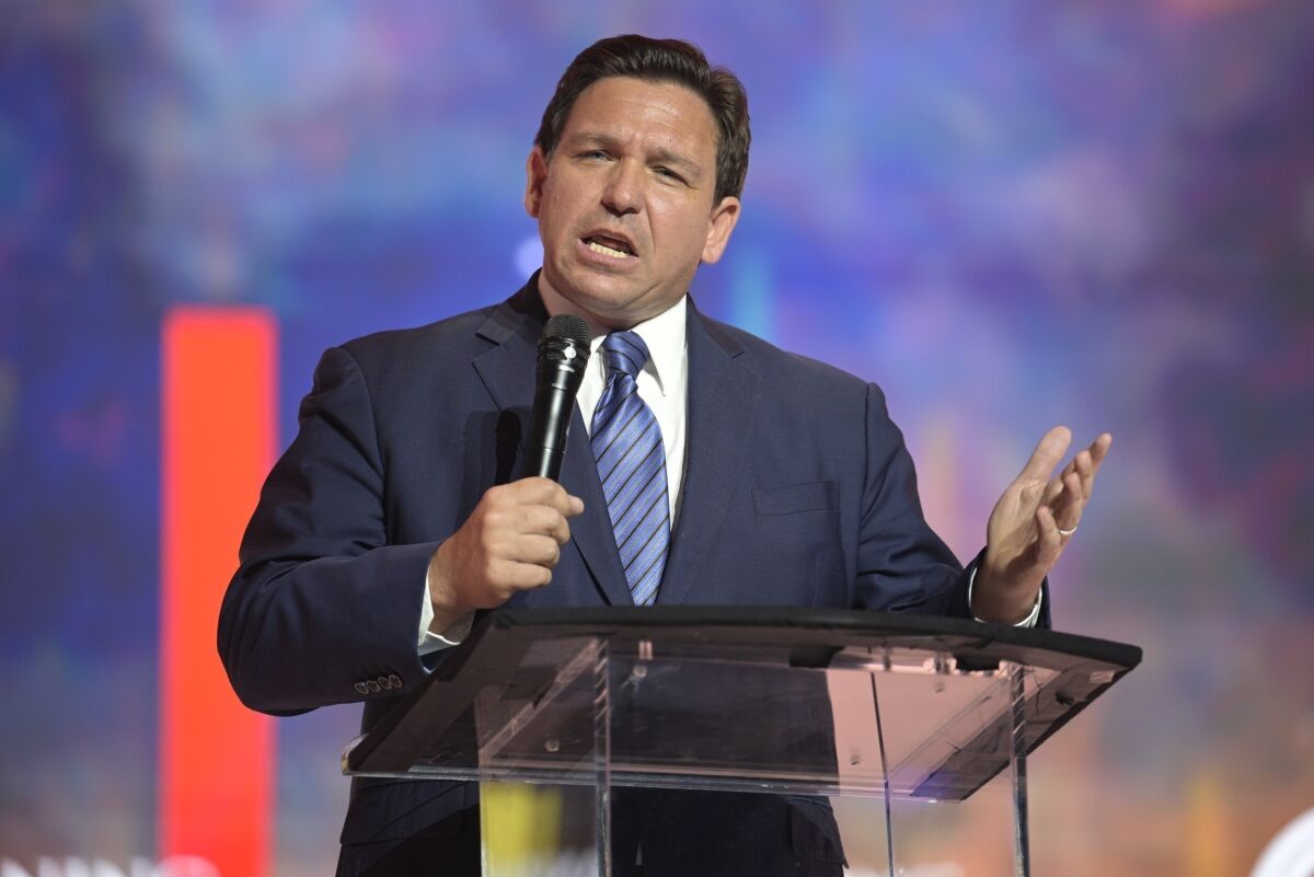 Florida Gov. Ron DeSantis is pictured speaking at a Turning Point USA Student Action Summit in 2022.