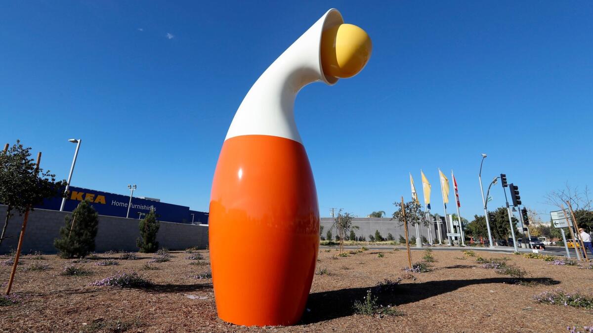 IKEA Burbank held its Art in Public Places sculpture dedication in front of the store on San Fernando Road in Burbank on Friday, Dec. 15, 2017. The art piece, a 16-foot-tall sculpture named "Bobble," was created by artist Christian Moeller, an art professor at UCLA.