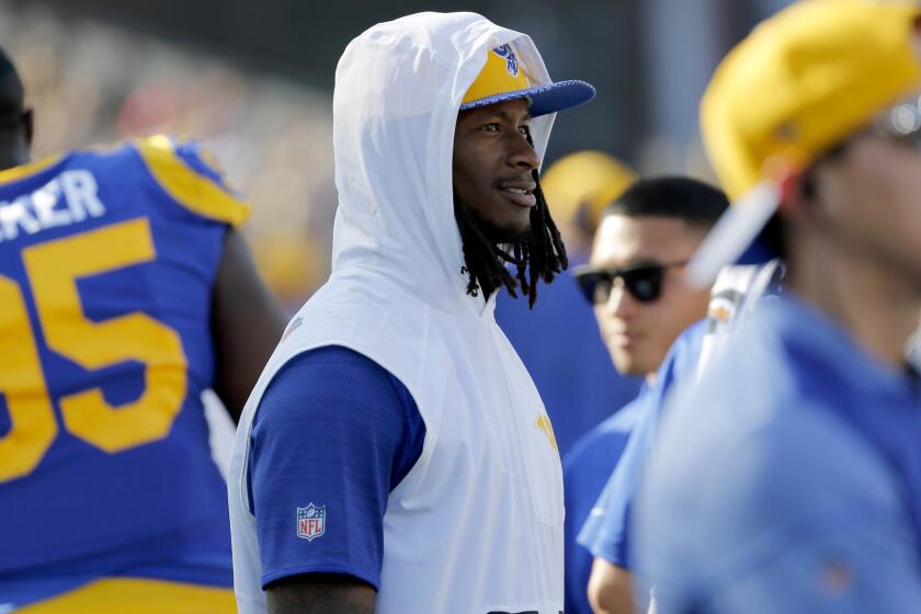 Rams running back Todd Gurley watches from the sidelines in a game against the 49ers on Dec. 31.