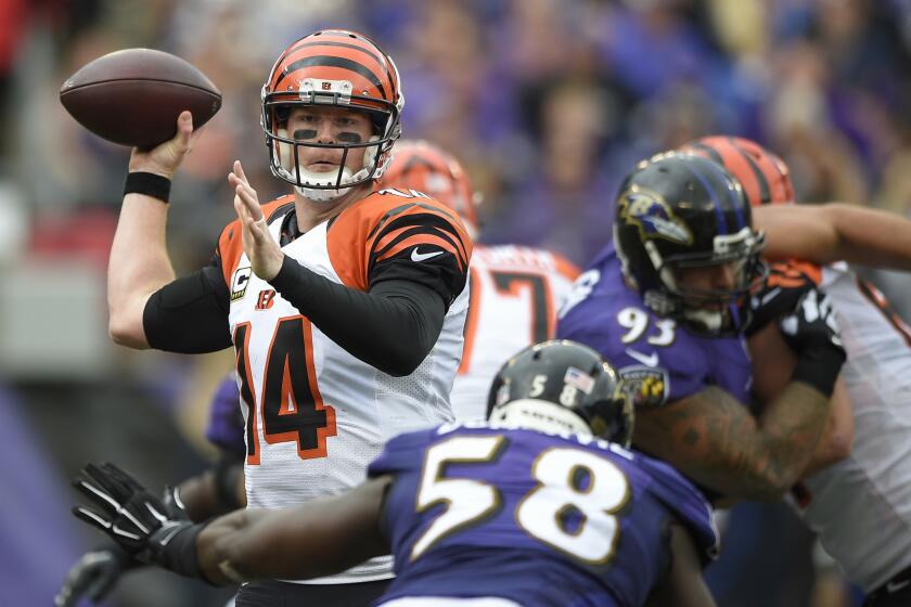 Cincinnati Bengals quarterback Andy Dalton passes the ball against the Baltimore Ravens during a game on Sept. 27.