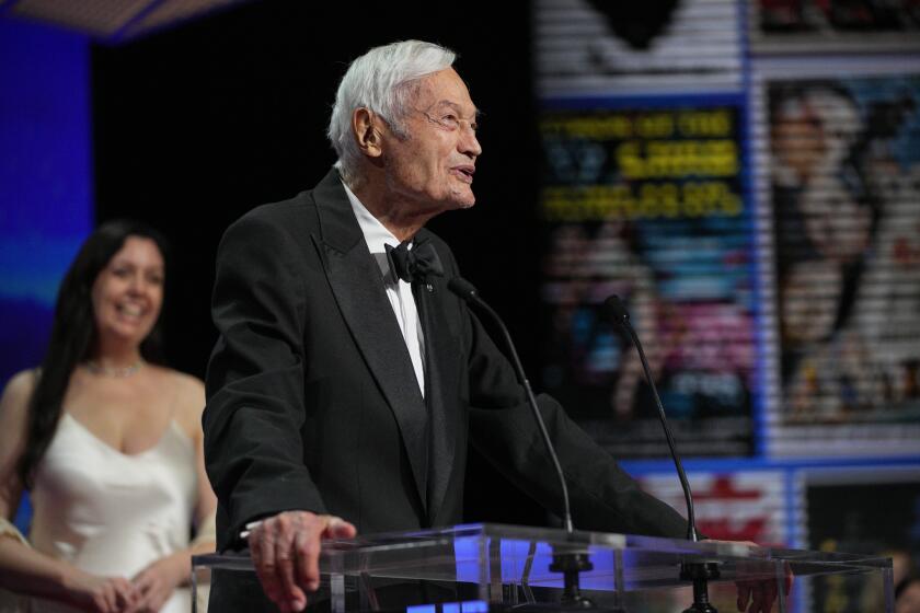 FILE - Roger Corman addresses the audience during the awards ceremony of the 76th international film festival, Cannes, southern France, Saturday, May 27, 2023. Corman, the Oscar-winning “King of the Bs” who helped turn out such low-budget classics as “Little Shop of Horrors” and “Attack of the Crab Monsters” and gave many of Hollywood's most famous actors and directors an early break, died Thursday, May 9, 2024. He was 98. (AP Photo/Daniel Cole, File)
