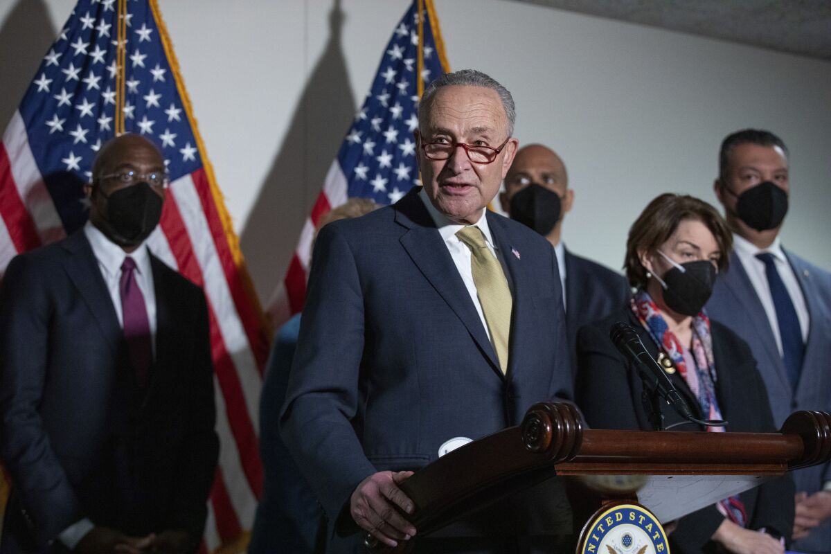 Senate Majority Leader Chuck Schumer, D-NY, speaks to the media after Democrats met privately with President Joe Biden.