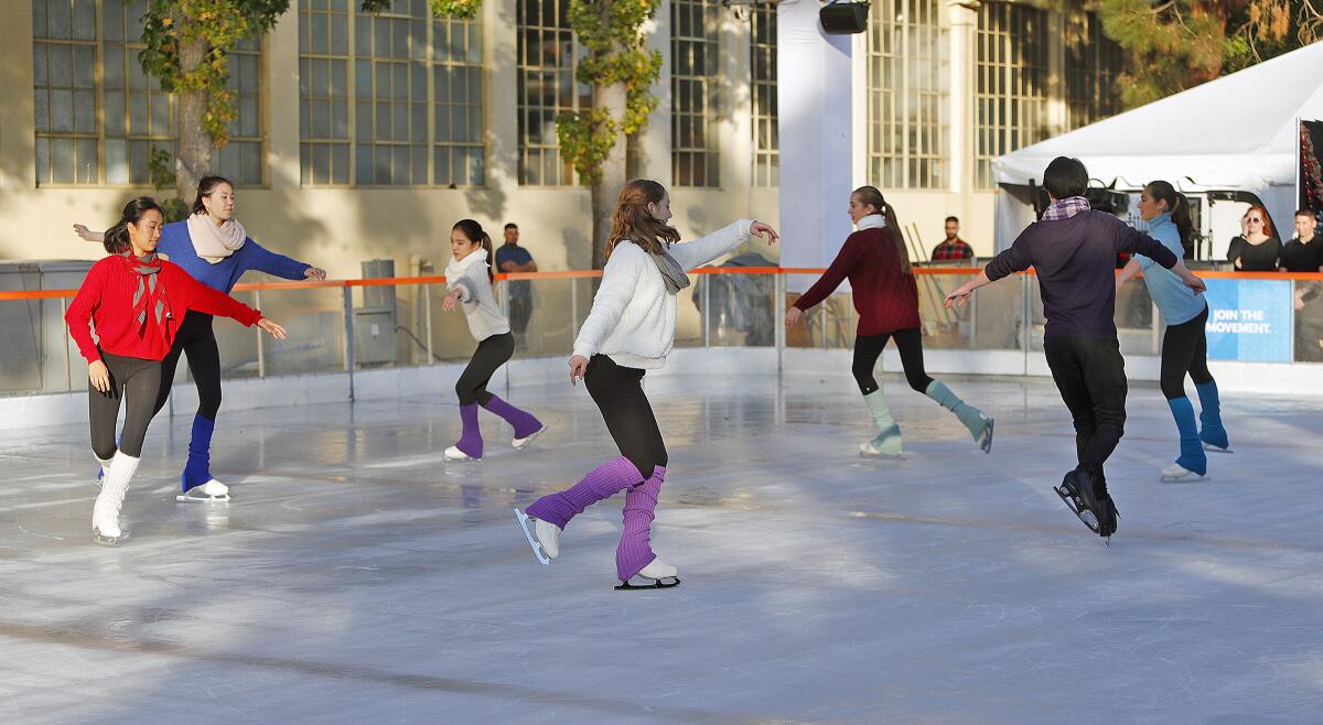 Skaters with the Los Angeles Ice Theater put on a performance at a Holiday on Ice event to mark the opening of a temporary ice rink on the parking lot behind Glendale City Hall on Nov. 22. A reader writes this week to call the effort a "boondoggle."