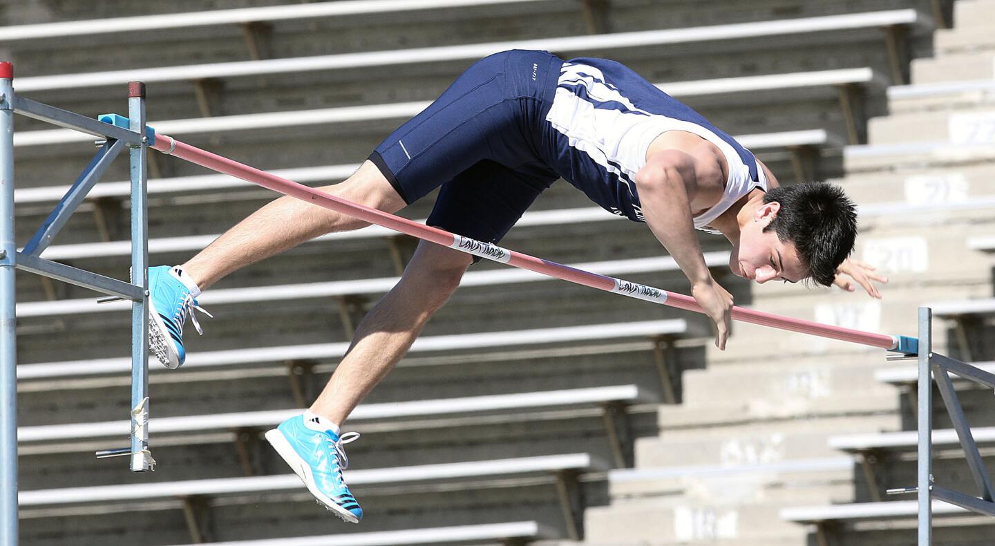 Flintridge Prep's Gareth Weiss qualifies for state with a vault of 15-2 during the CIF-SS Masters Meet at Cerritos College on Friday, May 30, 2014.