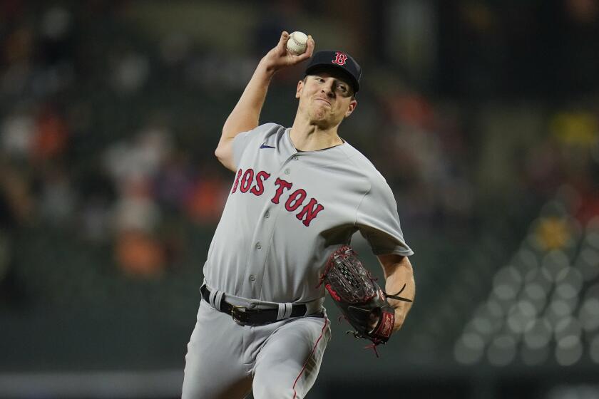 Boston Red Sox starting pitcher Nick Pivetta throws to the Baltimore Orioles in the first inning of a baseball game, Friday, Sept. 29, 2023, in Baltimore. (AP Photo/Julio Cortez)