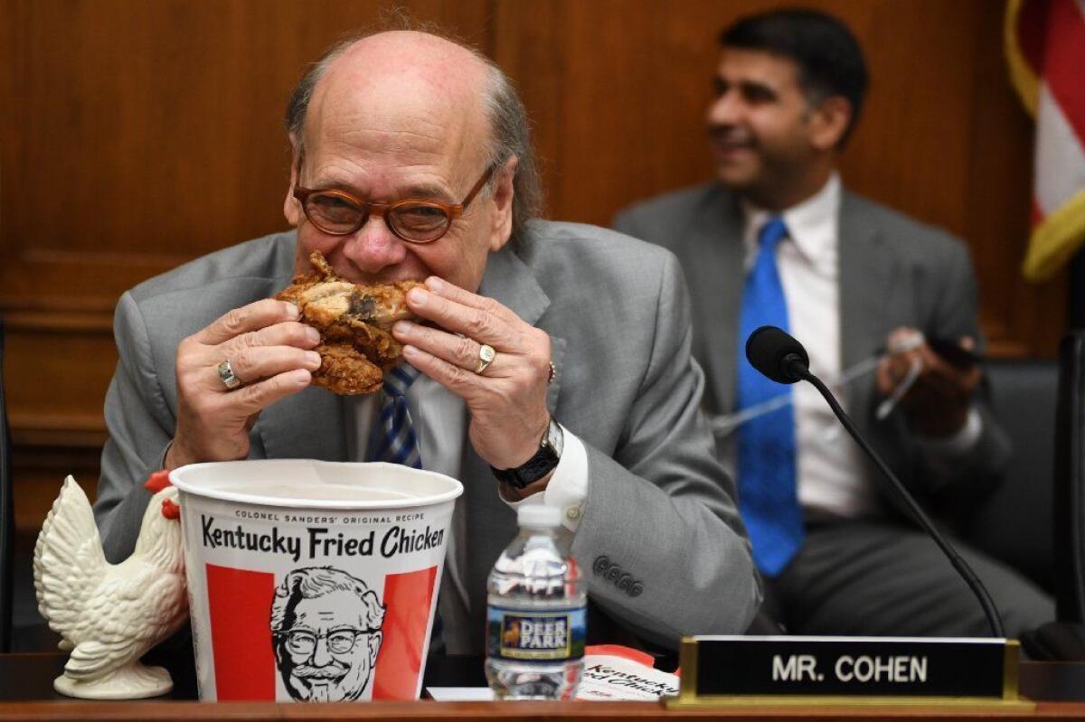 Rep. Steve Cohen (D-Tenn.) eats fried chicken during a House Judiciary Committee hearing to imply Atty. Gen. William Barr was a coward for not showing up.