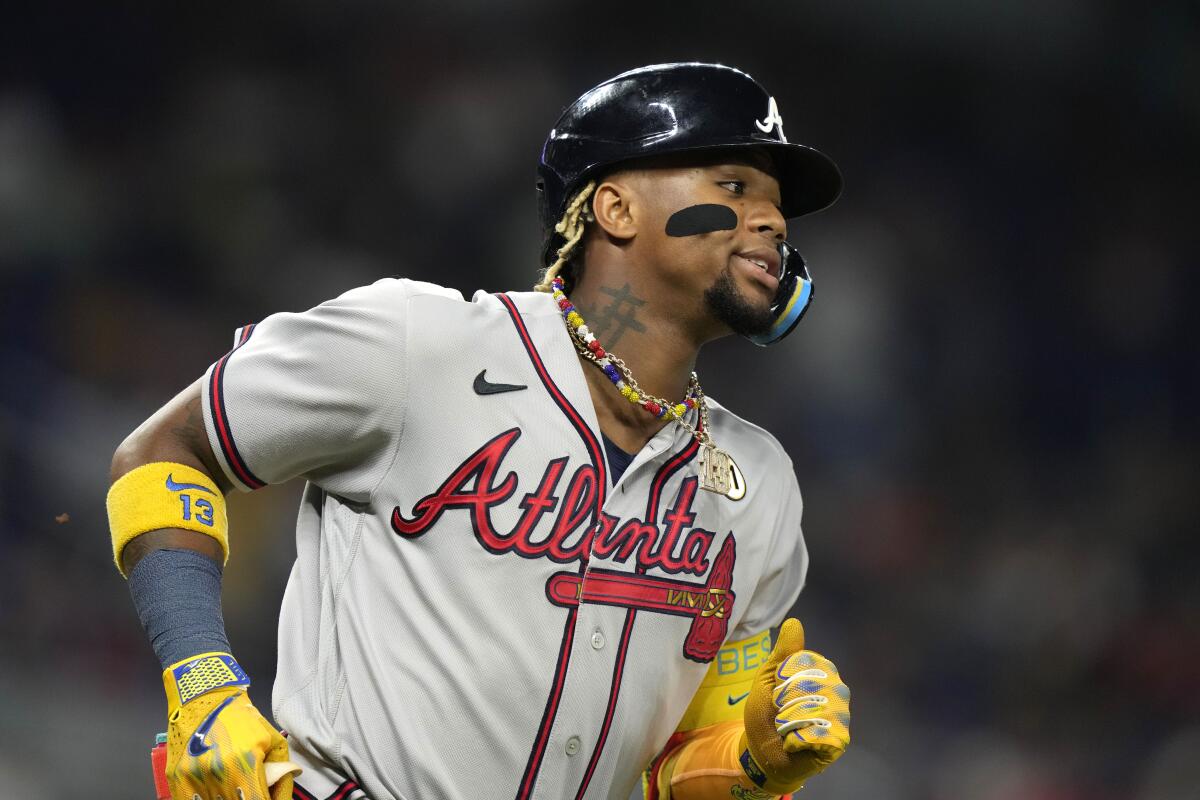 Braves' Ronald Acuña out of lineup vs Miami with right calf tightness - The  San Diego Union-Tribune