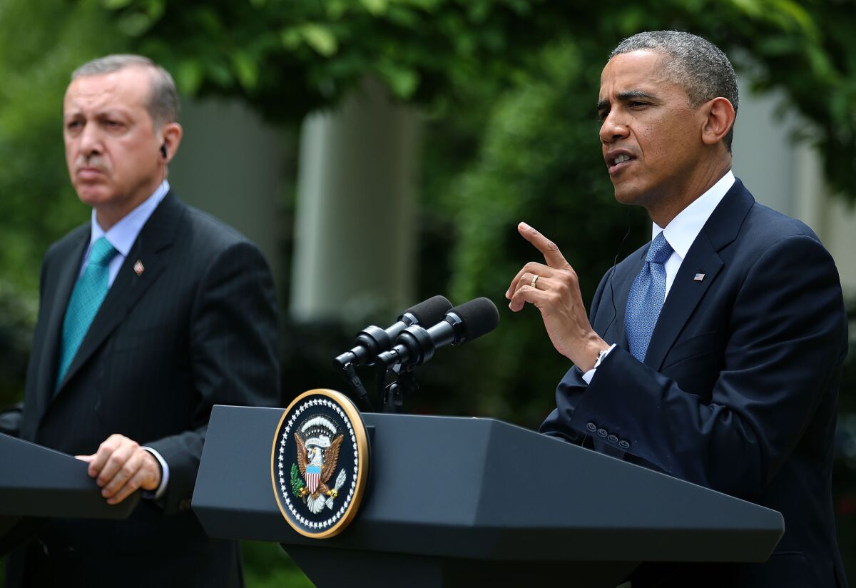 President Obama and Prime Minister Recep Tayyip Erdogan of Turkey speaking with reporters at the White House on Thursday. Obama said the United States would not act unilaterally in response to Syria's alleged use of chemical weapons.