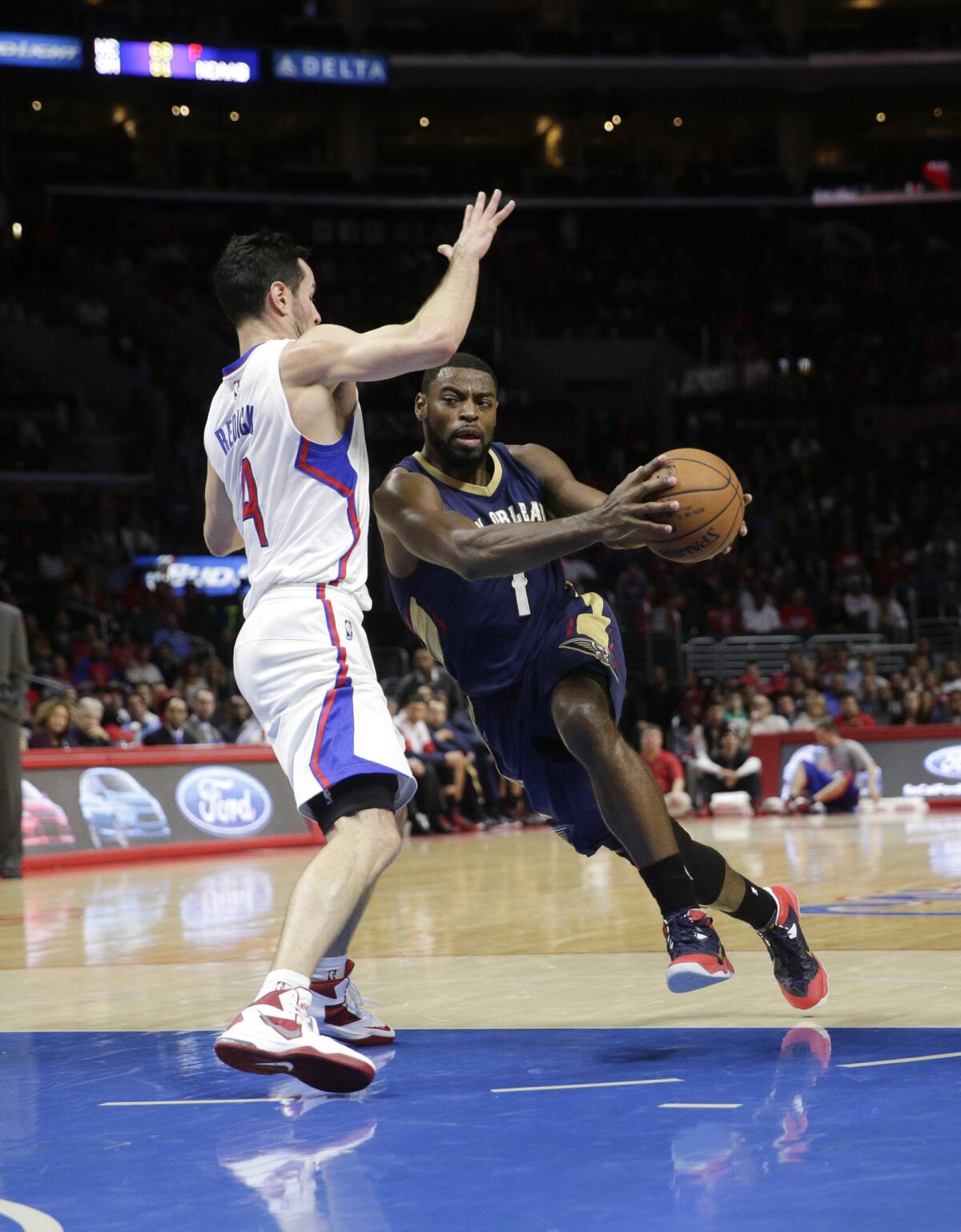 Clippers guard J.J. Redick tries to take a charge against Pelicans' guard Tyreke Evans earlier this month. Redick took three charges against the Bucks on Saturday.