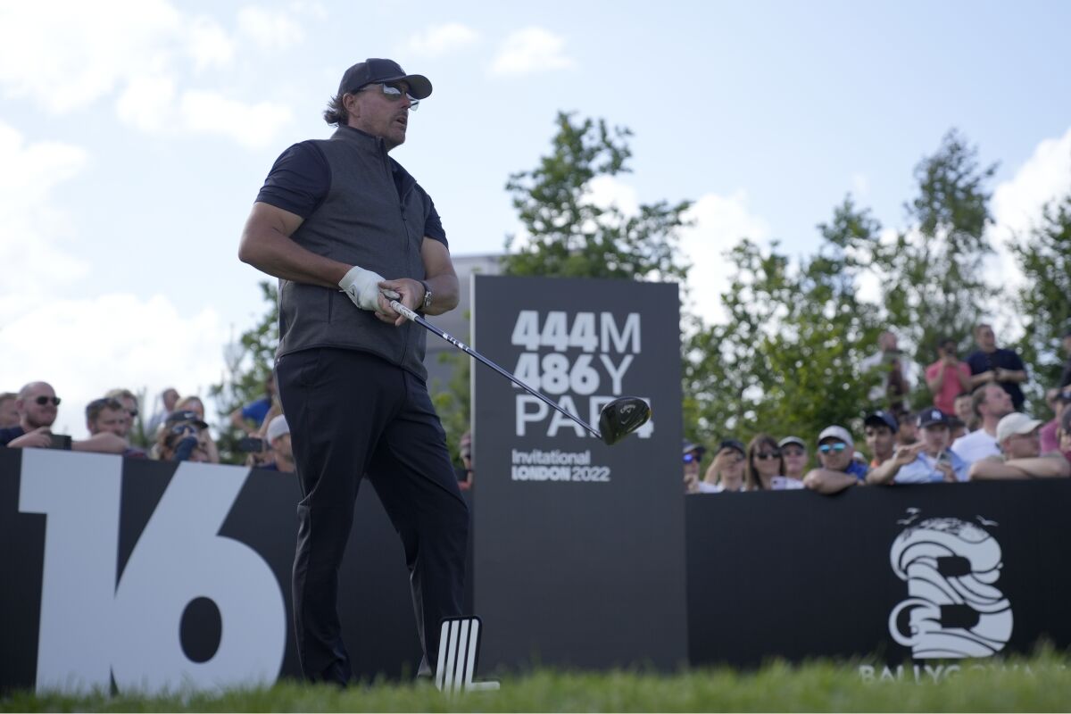 Phil Mickelson hits from the No. 16 tee Saturday in the LIV Golf Invitational at the Centurion Club in St. Albans, England.