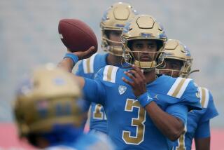 Pasadena, CA - UCLA Bruins quarterback Dante Moore warms up before a non-conference game.