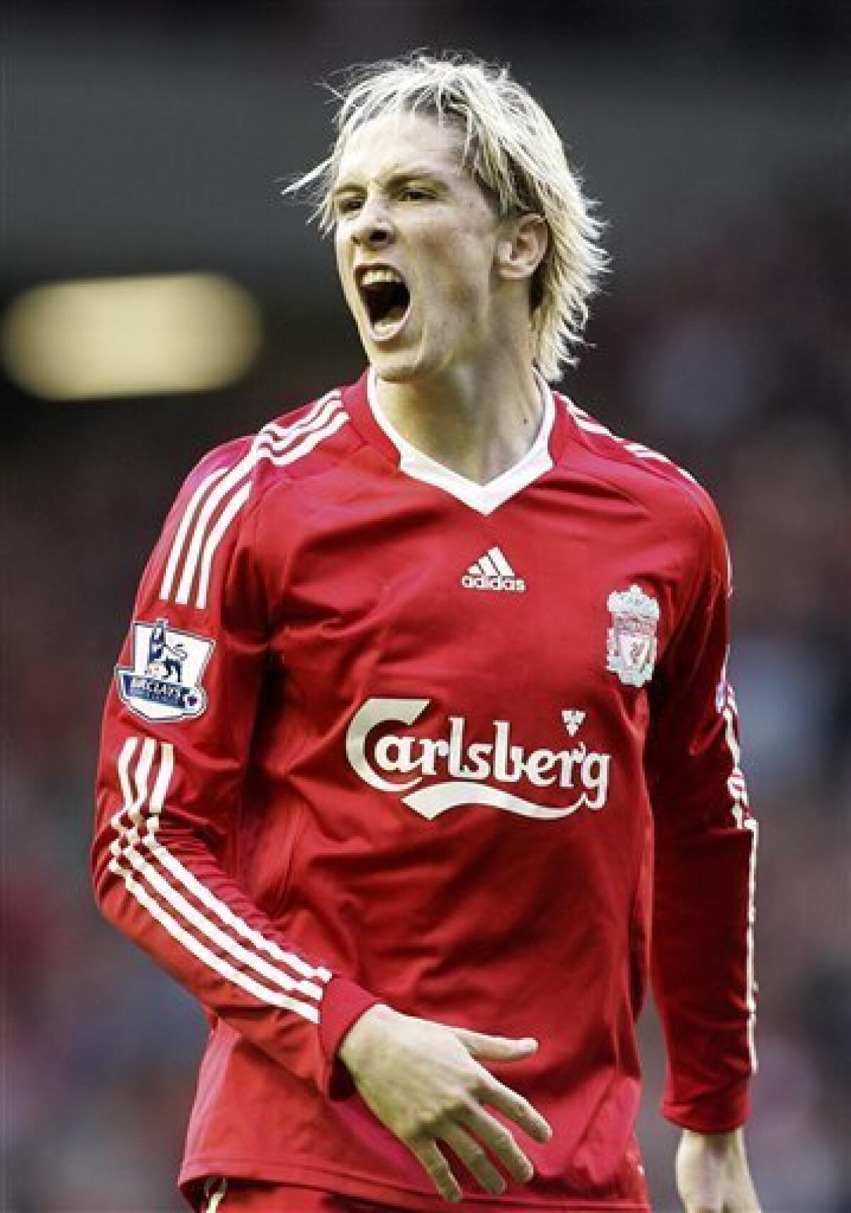 Liverpool's Fernando Torres reacts during their English Premier League soccer match against Manchester United at Anfield stadium, Liverpool, England, Sunday, Oct. 25, 2009. (AP Photo/Tim Hales)