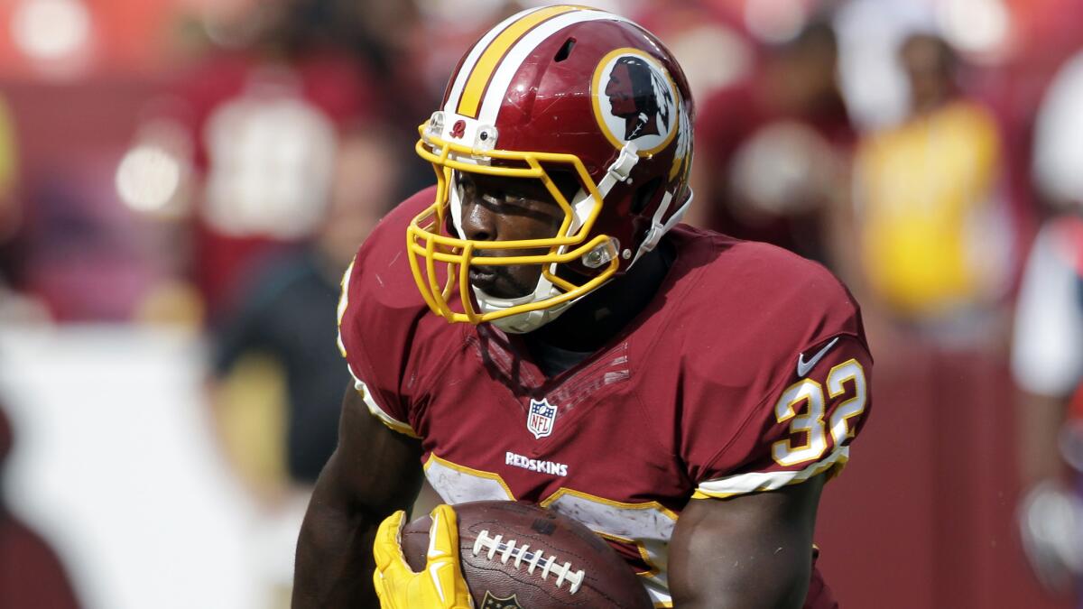 Washington Redskins running back Silas Redd carries the ball during a victory over the Jacksonville Jaguars on Sept. 14.