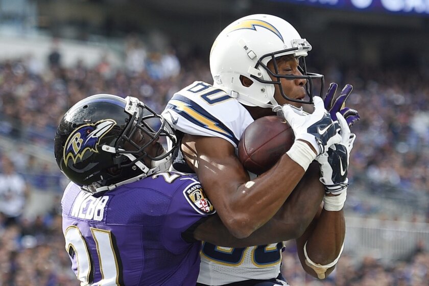 San Diego Chargers wide receiver Malcom Floyd (80) pulls in a touchdown pass despite interference from Baltimore Ravens cornerback Lardarius Webb (21) during the first half of an NFL football game in Baltimore, Sunday, Nov. 1, 2015. (AP Photo/Nick Wass)