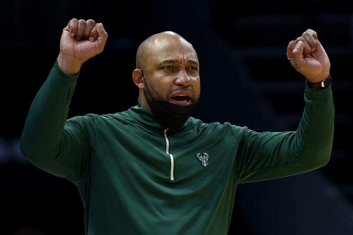 Darvin Ham gestures during a game between the Milwaukee Bucks and Charlotte Hornets in January 2022.