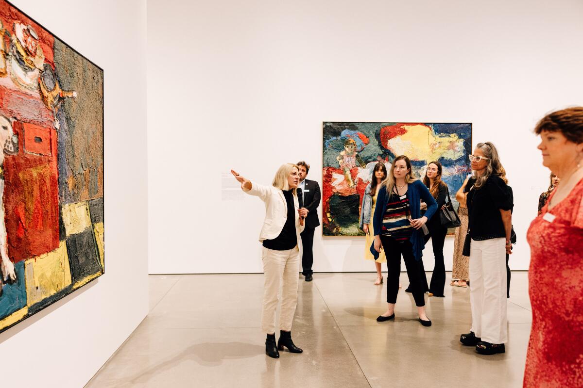 CEO and director of Orange County Museum of Art Heidi Zuckerman gives a tour of the recent Joan Brown exhibit.