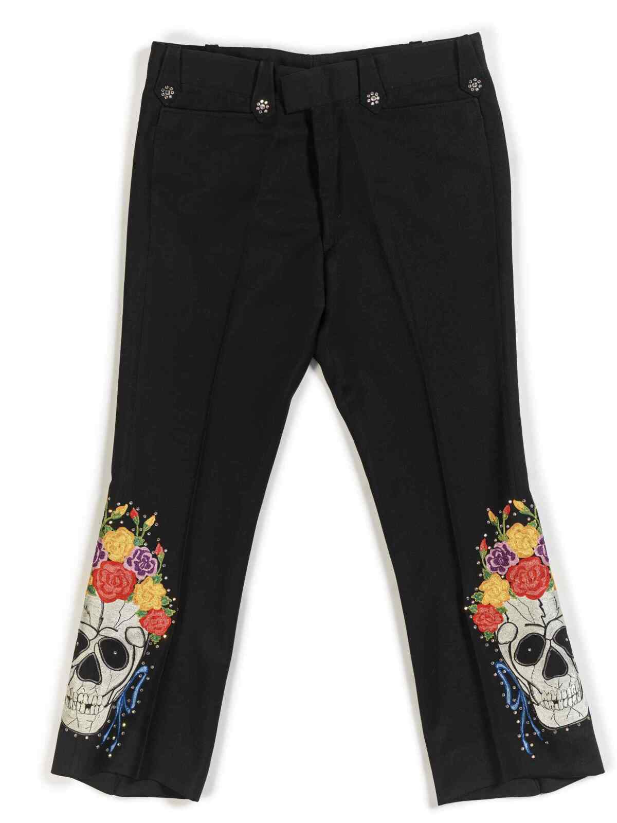 Skull-embroidered custom pants. 