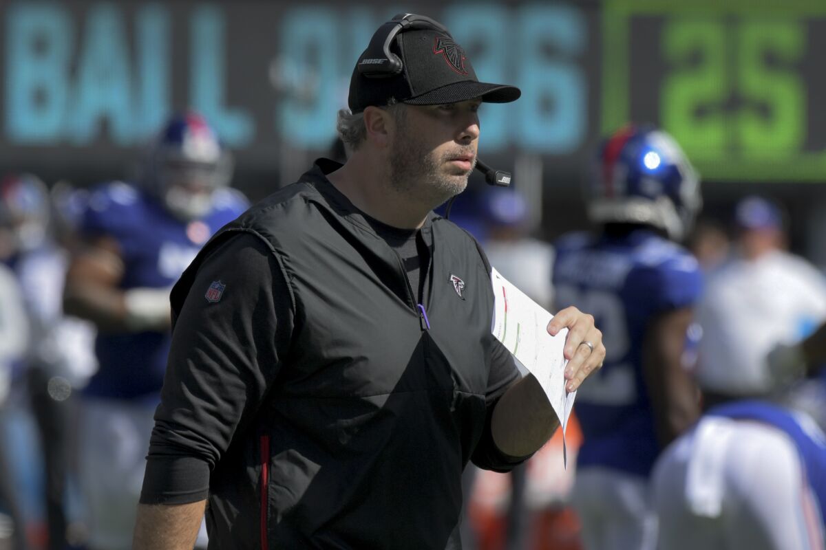 Atlanta Falcons head coach Arthur Smith works the sidelines during the first half of an NFL football game against the New York Giants, Sunday, Sept. 26, 2021, in East Rutherford, N.J. (AP Photo/Bill Kostroun)