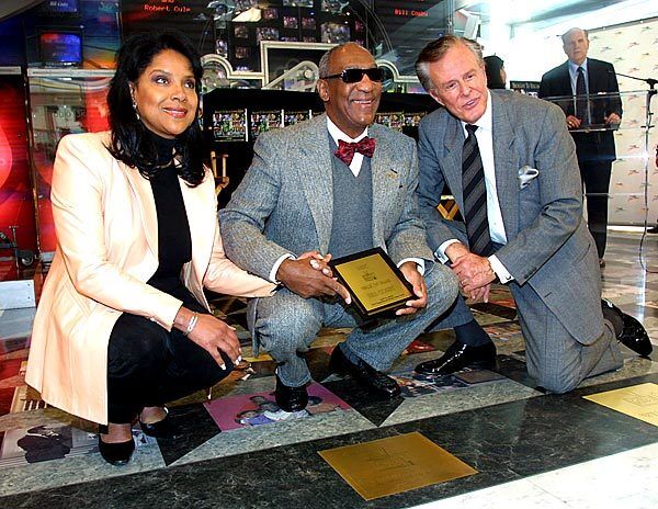 Phylicia Rashad and Robert Culp join Bill Cosby in 2002 at Cosby's induction into NBC's Walk of Fame in New York.