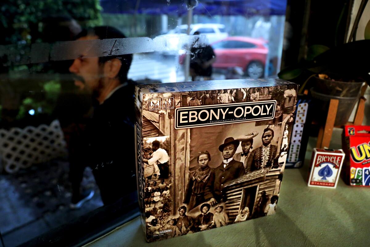 An Ebony-opoly board game is displayed at Blaxicocina, a Mexico City soul food restaurant.
